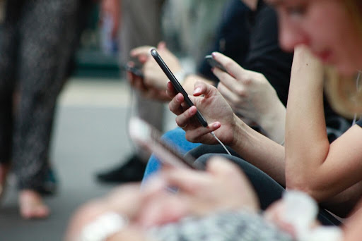 Using social media on a phone.